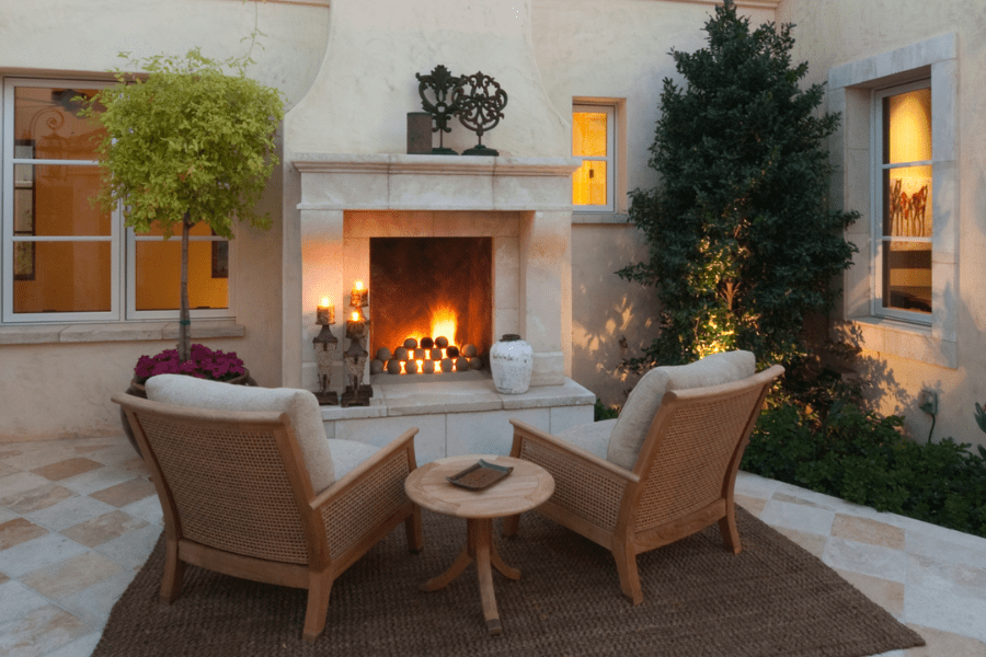 Fireplace added for warming outdoor space.
