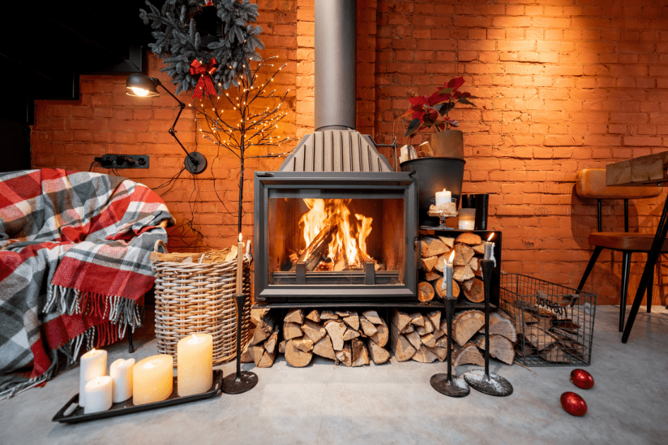 Fireplace surrounded by tartan décor and candles 