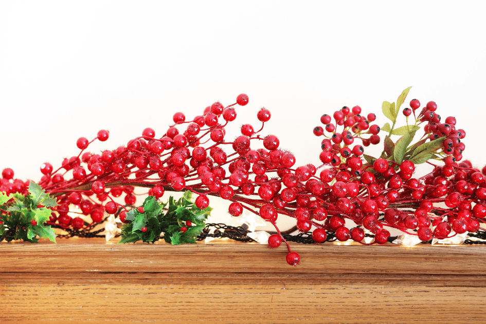 Holly and berries on a mantle 