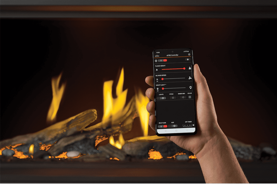 Gas fireplace insert being controlled by a cell phone