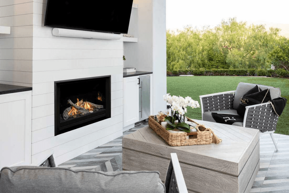 Beautiful white patio setting with a Valor gas fireplace insert