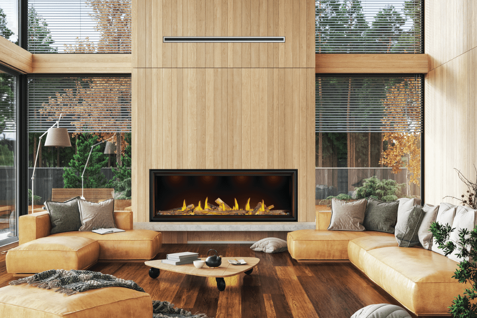 Beautiful fall fireplace decor with tan leather seating and natural decor elements throughout