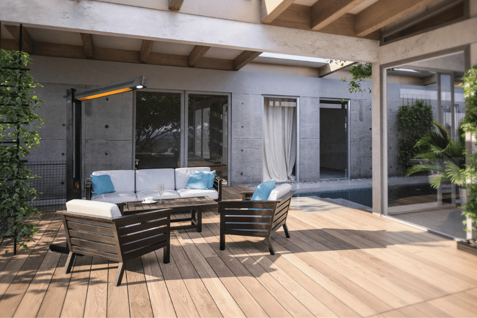 An electric heater warms an outdoor patio set on an overcast day. 